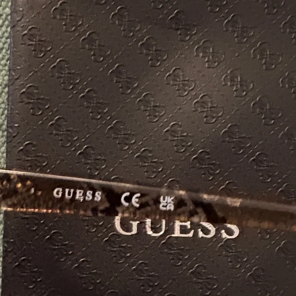 Guess Snake Pattern Tortoise Sunglasses